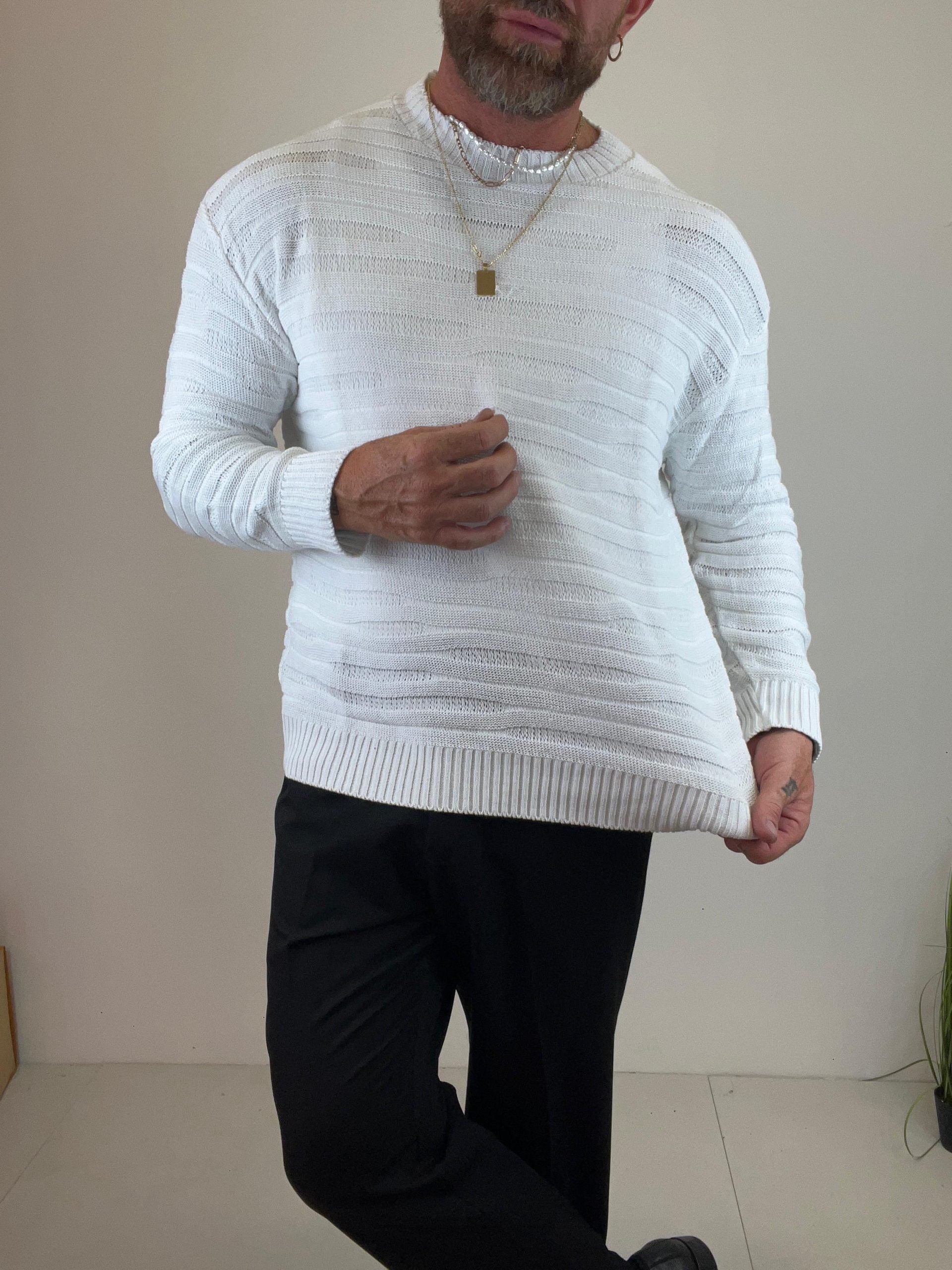 Maglione bianco con cuciture